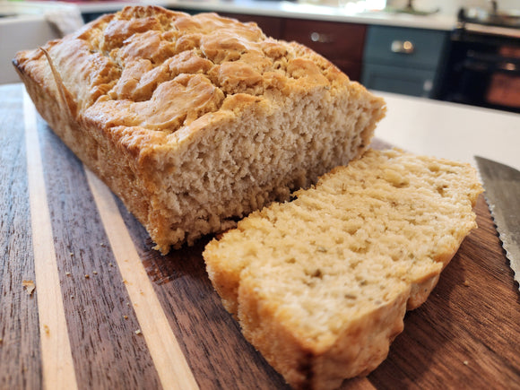 A slice of our Rosemary Garlic Beer Bread Baking Mix from The Summer Kitchen