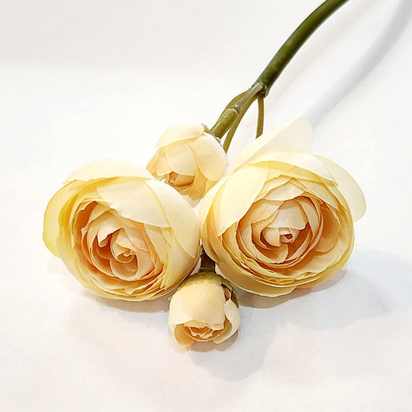 Is there anything sweeter than a little bunch of ranunculus? This stem of four ivory blush flowers would be perfect in a petite vase or with other flowers to brighten your day!  Approximately 11