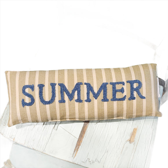 <p>Summertime is the BEST time to decorate! This mini pillow has a khaki and cream striped background with the word 