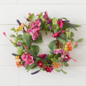 <p><span data-mce-fragment="1">You'll LOVE the vibrant colors in this wreath! Pansys, Butterflies and other cottage flowers and berries surround this beautiful wreath in pinks, purples and greens. </span></p> <p><span>Polyester, Plastic, Wire, Paper</span></p> <p><span>Approximately 18" D (inside of wreath is 7")</span></p>