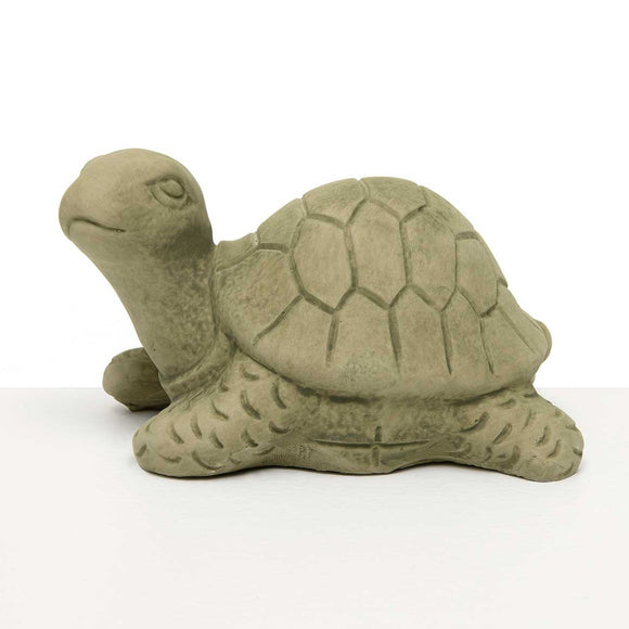 <p>This cute little verde green cement turtle is looking up and will look adorable peeking out from under a plant indoors or outdoors.  </p> <p>Approximately 4