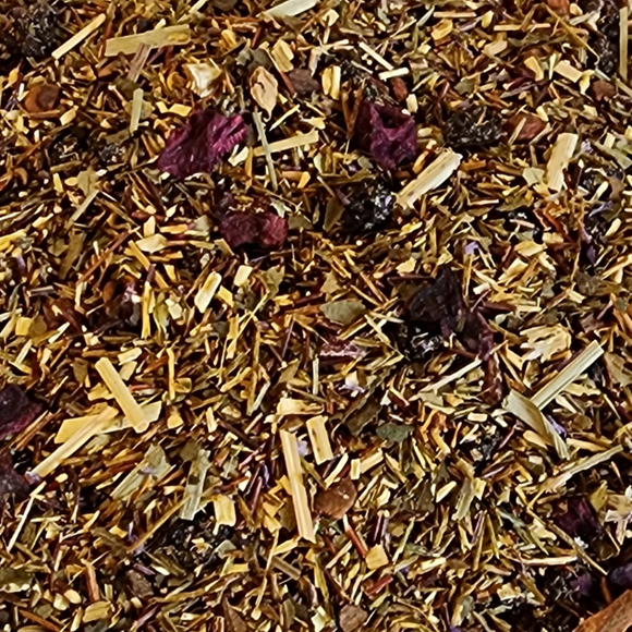 You’ll be greeted with a sweet, blueberry fruit and cake taste with slight accents of spice in the herbal tea!  2oz, Organic Green Rooibos, currants, beetroot, organic cinnamon, sweet blackberry leaves, flavoring, organic lemongrass, and Malva flowers.  Caffeine Level: None
