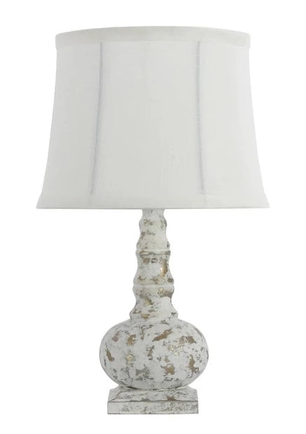 This striking accent lamp f features a casually elegant finish in silver and white. A classic look for any room in the house. This little lamp adds the perfect touch to a powder room bedroom, living room, bookcase, or small accent table. Use it as a night light or accent light.   25-watt bulb not included.  15
