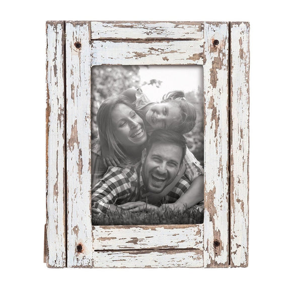 This is one of our most popular items!  Instantly add cozy charm to any space with this distressed wooden frame with its white washed finish and black accent crews in the corners. It will fit a 5X7 photo and can sit horizontally or vertically depending on your picture.