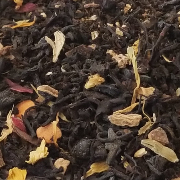 Full astringency. Warming and comforting in the chai tradition with pumpkin          ghoulish notes. Excellent with milk.  2oz, Black Tea: Cinnamon, Apple, Rosehip, Orange Pieces, Ginger, Cardamom, Black & White Pepper, Candy, Hibiscus, Calendula, Sunflower Petals, Clove, Nutmeg, Natural Flavors. (Organic Compliant)   