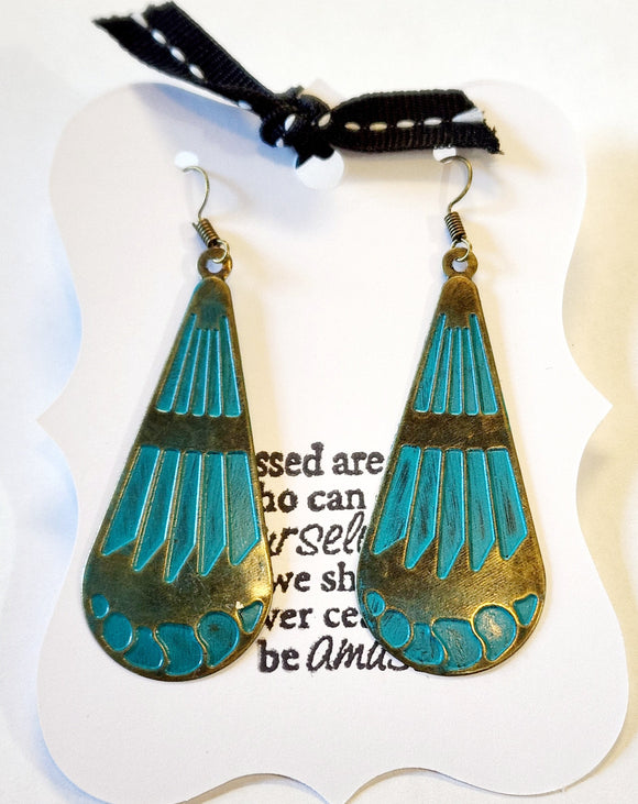 Art Deco-inspired lines make these earrings simply lovely. The hand-painted drop earrings come on an antiqued bronze ear wire.  Painted in turquoise and distressed.  The metal is nickel and lead-free and very lightweight.  Approximately 3