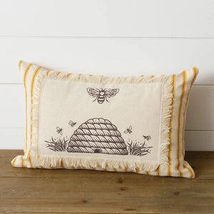 Oh, honey, you'll be the Queen Bee with this rectangle pillow!  The background of the pillow is a fresh & fun yellow stripe on a cream background. On top of that is a cream rectangle with frayed edges sewn all around the edges. Inside the frayed rectangle is a black drawing of a beehive with a bee above it.    10"" H x 17"" W  Cotton, Polyester Fiber