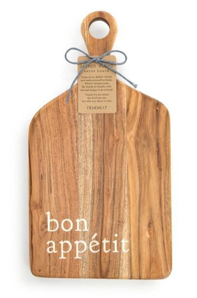This artisan acacia wood serving board was inspired by the sweet moments of an at-home gathering. Along the bottom of the board are the words 