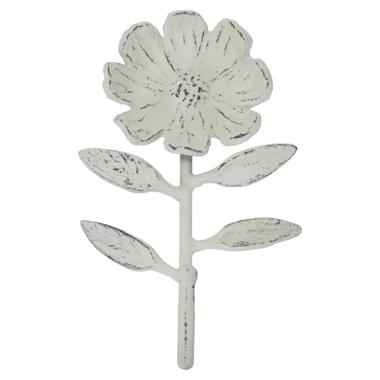 Add a touch of whimsy to your walls with our flower wall hook!. This cast iron hook features a simple flower shape with dainty leaves finished with a distressed matte chalk-paint like white with charcoal undertones. Great for decorative purposes as well as a functional hook for holding your favorite accessories or garden tools.  Weight capacity is 6.5lbs -Inset keyhole hanger at the back allows for easy hanging (hardware not included).  4