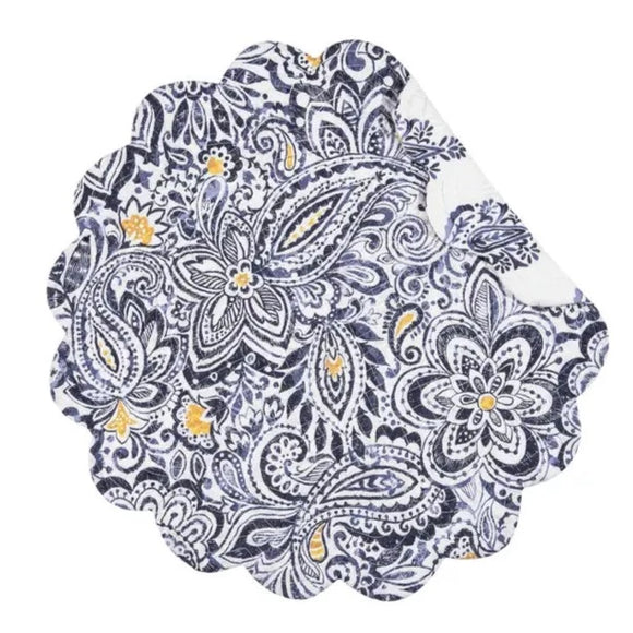 This quilted placemat brings happiness to your home with a gorgeous floral paisley design in denim on a white background with touches of yellow. It reverses to a denim block print with yellow floral designs on top of a white background. It will easily brighten any tablescape. Finished with a scalloped edge, this tabletop collection is crafted of 100% cotton and hand-guided machine quilting.  Machine wash cold and tumble dry low for easy care.  17