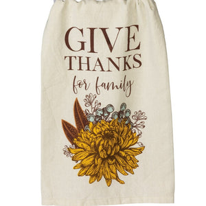 This natural muslin cotton kitchen towel has the words "Give Thanks for Family" in a mixed font above beautiful botanicals in golds, browns, and robin egg blues.  Machine-washable.  28" x 28"