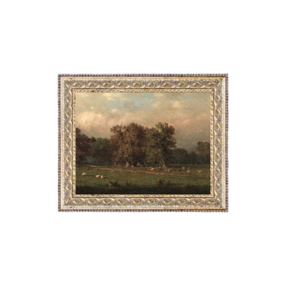 We just love this sweet print of a sheep farm! Printed on premium canvas fabric for a lasting, textured finish and has a handcrafted ornate silver/gold frame that adds a classic charm.  Comes with a paper backing and hanging hardware for easy installation.

Made in the USA: Proudly crafted with quality and care. 

Care Instructions: Keep canvas dry to maintain its quality. If smudged or dirty, gently wipe with a dry, soft cloth.