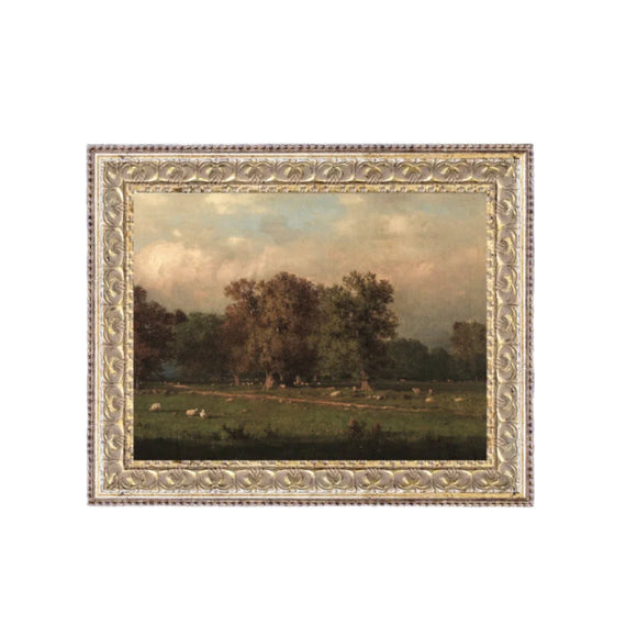 We just love this sweet print of a sheep farm! Printed on premium canvas fabric for a lasting, textured finish and has a handcrafted ornate silver/gold frame that adds a classic charm.  Comes with a paper backing and hanging hardware for easy installation.

Made in the USA: Proudly crafted with quality and care. 

Care Instructions: Keep canvas dry to maintain its quality. If smudged or dirty, gently wipe with a dry, soft cloth.
