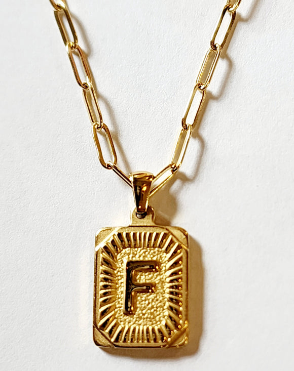 These initial necklaces are one of the hottest looks for this season!  Gold-plated rectangle initial charm with the letter 