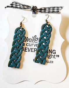 You'll love wearing these beautifully looped Celtic knot design earrings!  It measures 2" tall by 1/2" wide with a 4 1/2" drop.  Hand-painted. Lead and nickel free.  Painted in Nordic blue color and distressed