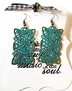 Rectangle in shape, these filigree earrings are big on style. These sweet earrings are the perfect size and will get you all the compliments!  2 1/2" drop.  Hand-painted in teal. Lead and nickel free