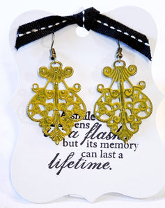 What does a modern girl wear to the ball? These little earrings will make any day feel special!  Painted in a  citron yellow finish and distressed.  This filigree earring measures 1 1/2" by 1 1/8" with a 2 1/2" drop leng