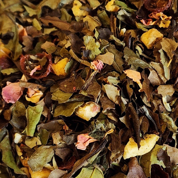 Full of fruits and flowers, this white tea looks like Spring in a cup and tastes like it, too – delicious!   1 oz, White Tea: Rose Hips, Hibiscus, Apple Pieces, Rose Petals, Cranberries, Mango Pieces, Pineapple Pieces, Natural Pineapple Flavor, Natural Mango Flavor & Blueberries.            Antioxidant Level: High, Caffeine Level: Low