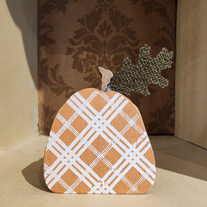 Celebrate autumn with this cute pumpkin! It features a charming orange plaid pattern and a beautiful green leaf accent.   3” H x 2.5” W x .75”D