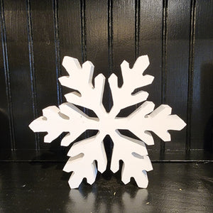 This wooden snowflake is so fun to decorate with for the holiday season!  So many fun possibilities!  6"H x 6"W x .75"D