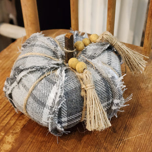This cream fabric pumpkin is adorable and ready to put a bright spot in your fall decor this year! It has twine accents and a beaded twine bowl around the wooden stem.  4" Dia  Polyester, Wood