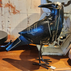Add this spooky recycled iron blackbird to your tabletop decor. Made of recycled materials some imperfections and color variations may be present, which add to the uniqueness, character, and charm of the product  12"w x 10"t  Wipe clean with a lint-free, dry cloth