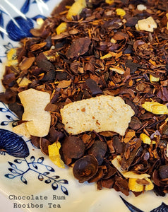 Delicately dark chocolate notes of cocoa beans and sweet milk chocolate flavors, rounded off by some fruity run aromas, are meeting on a mild Rooibos tea!  Brew by using 1heaping teaspoon per 8 ounces of water.  Pour water (212 degrees) over tea in a warmed cup and steep for 5-10 minutes.  Store in a cool, dry place away from light or heat.  Do not refrigerate.  Caffeine level: None