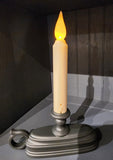 Oh, how we love this candle!  Put it in a window, or use it in your displays!  It will automatically turn on at dusk and off at dawn.  It has a realistic flickering flame that changes from white to amber by just tilting the candle upside down and back again! How cool is that?