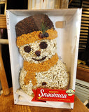 Frosty is a solid snowman made of safflower seed and sunflower hearts. He is decorated with more premium seeds and cherries. He is 100% edible! Jute hanger and net included.