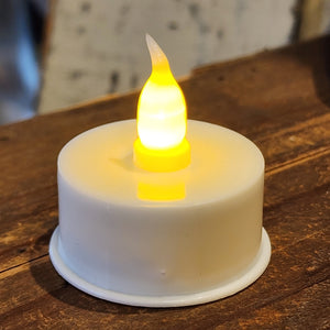 This white-based tea light is perfect to give a little glow wherever you need it!  It has a timer, so when you turn it on, it will stay on for 8 hours and turn off and will turn back on the same time you turned it on the next day!