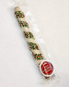 A sweet take on our original pretzels, these scrumptious pretzel rods get a generous dip in Sea Salt caramel and are covered in white chocolate and striped all around the pretzel with green, white, and red nonpareil candies.  Approximately 7.5" long