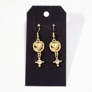 Not too big and not too small, these earrings are just right and perfect for every day! Gold earrings with a beautiful heart design in the center and a dangling gold piece with a little bling in the center ~ fabulous!  Approximately 2" in length