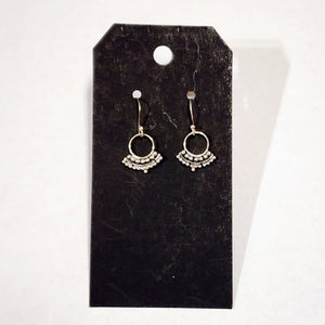 These little earrings will be your go-to accessory. They are lightweight and full of personality!  Sterling Silver  Dimensions: 0.6" l x 0.6" w  Made in India