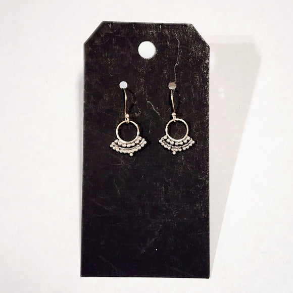 These little earrings will be your go-to accessory. They are lightweight and full of personality!  Sterling Silver  Dimensions: 0.6