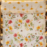 You'll love this beautiful table runner, it's a perfect piece to bring in some instant sunshine!  We love the pink and yellow flowers scattered in with white daisies and bumble bees - so very happy!  Cotton  55" L x 14"W