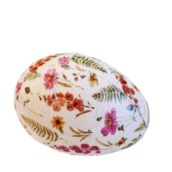 We love these happy wooden eggs! This one is decoupaged with a vibrant floral design on a white background.  Wood & Paper  1.50