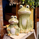 The small frog is shown here with our larger frog to show the size difference.
