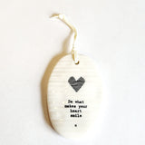 <p><span data-mce-fragment="1">This oval-shaped porcelain ornament is perfect to give to someone to let them know you are thinking of them! There is a heart on the ornament with the words "Do what makes your heart smile" written below.</span></p> <p><span data-mce-fragment="1">2 1/4" W x 3 1/4" H</span></p>