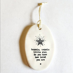 <p><span data-mce-fragment="1">This oval-shaped porcelain ornament is perfect to give to someone to let them know you are thinking of them! Above is a shining star with the words "Twinkle, twinkle, little star, do you know how loved you are" below.</span></p> <p><span data-mce-fragment="1">2 1/4" W x 3 1/4" H</span></p>