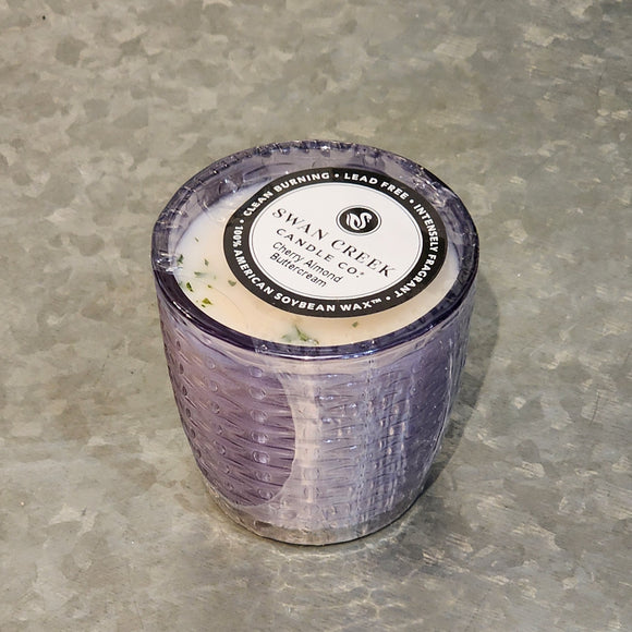 You'll love our newest candle style & size! This cherry almond buttercream candle has been poured into a pretty basketweave lavender glass.
