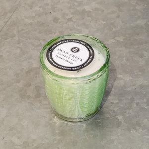 You'll love our newest candle style &amp; size! This farmer's market candle has been poured into a pretty basketweave of green glass.