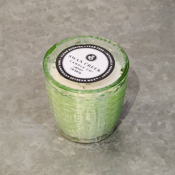 You'll love our newest candle style & size! This lemon verbena candle has been poured into a pretty basketweave of green glass.