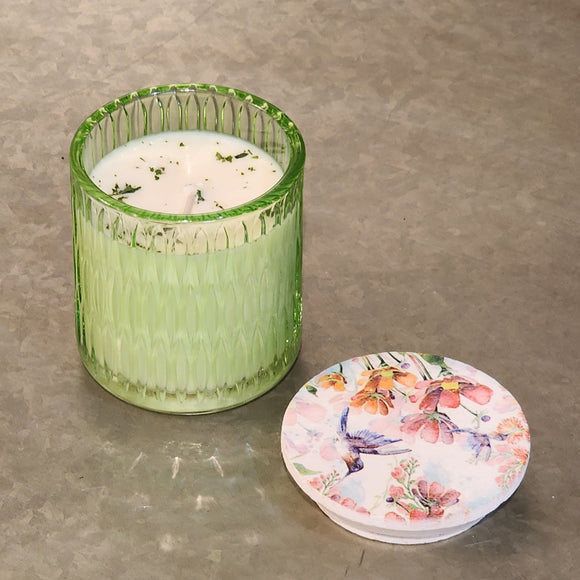 <p><span>You'll love our newest candle style and size! This Thai pear candle has been poured into a pretty green patterned glass and comes with a butterfly or hummingbird lid.</span></p> <p><span>Fresh and crisp, a pure pear fragrance with earthy notes on the back end.</span></p>