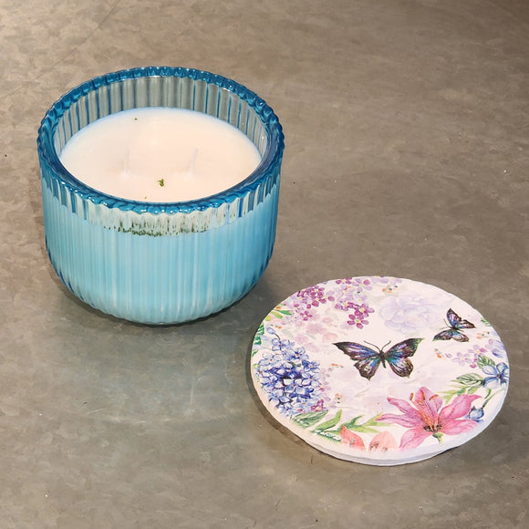 <p><span>You'll love our newest candle style and size! This southern sweet tea candle has been poured into a pretty blue</span><span style=