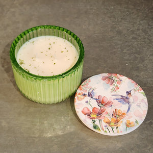 <p><span>You'll love our newest candle style and size! This citrus &amp; sage candle has been poured into a pretty green</span><span style="font-size: 0.875rem;">-patterned glass and comes with a butterfly or hummingbird lid.</span></p> <p><span>An upfront Sage note followed by a blend of citrus that is certain to be enjoyed!</span></p>