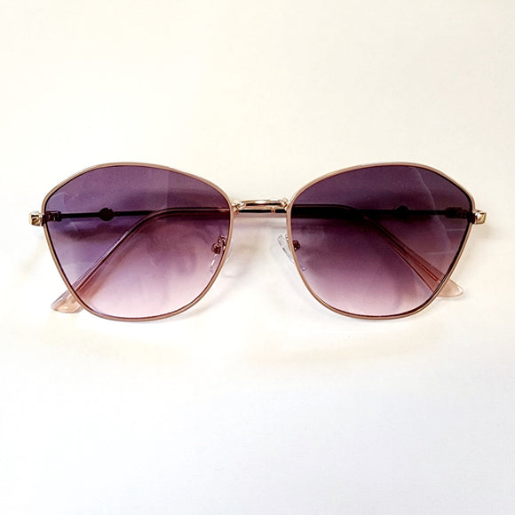 These frames feature gradient plum lenses that provide both style and sun protection. The accompanying collapsible floral printed case adds a touch of convenience and charm. Whether lounging on the beach or strolling through the city, these sunglasses are the perfect way to add color and style to your look.