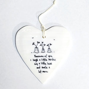 Our "Because of you, I laugh a little harder, cry a little less and smile a lot more" Porcelain Heart Ornament makes a heartfelt gift!  Approximately 3&nbsp;1/2"&nbsp;w x 4"&nbsp;h