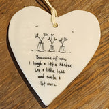 Our "Because of you, I laugh a little harder, cry a little less and smile a lot more" Porcelain Heart Ornament makes a heartfelt gift!  Approximately 3&nbsp;1/2"&nbsp;w x 4"&nbsp;h