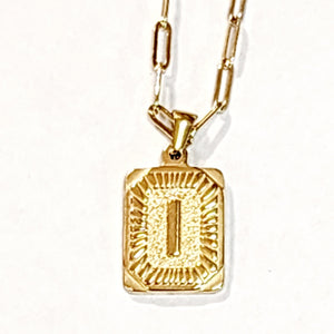 These initial necklaces are one of the hottest looks for this season! A gold-plated rectangle initial charm with the letter "I" on it comes on an 18-inch paper clip chain with a 2-inch&nbsp;extender&nbsp;and&nbsp;a lobster clasp closure.  Made in the USA.