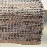 Need to add a little texture to your home? You'll love these incredibly stylish, sustainable, and durable hand-woven khaki and slate-colored table runners. They will surely enrich the décor of any surface in your home. Made with Jute and cotton, these runners are environmentally friendly, sustainable, trendy, and stylish.  13" W x 72"L  Spot clean only.  Jute &amp; Cotton  Handmade in India